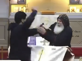 Screengrab obtained from video posted to social media shows man stabbing a bishop at the Christ the Good Shepherd in Sydney on Monday, April 15, 2024.